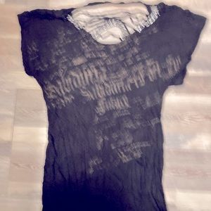 Guess top with cutout details in back with a chain